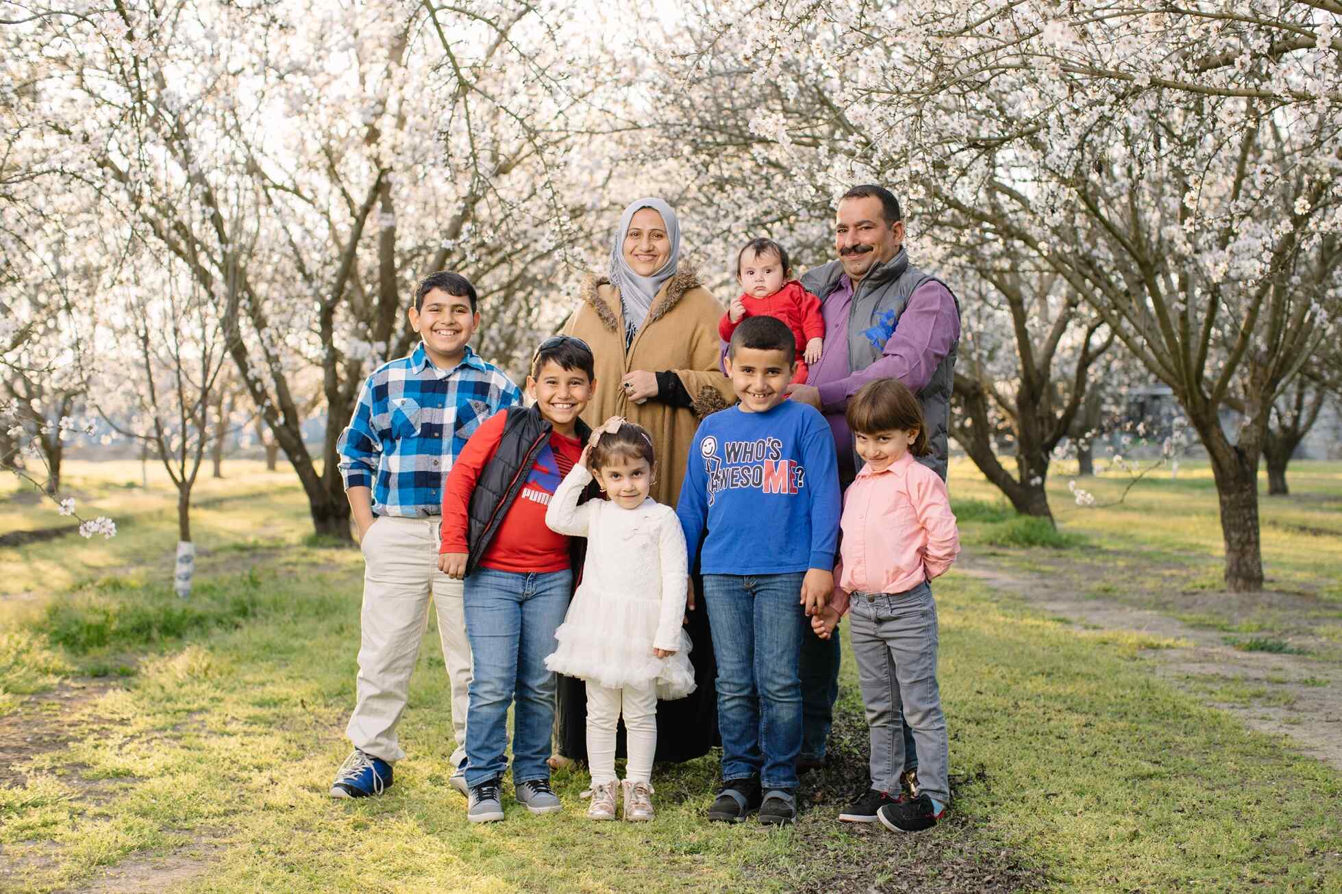 A family posing for a family portrait.